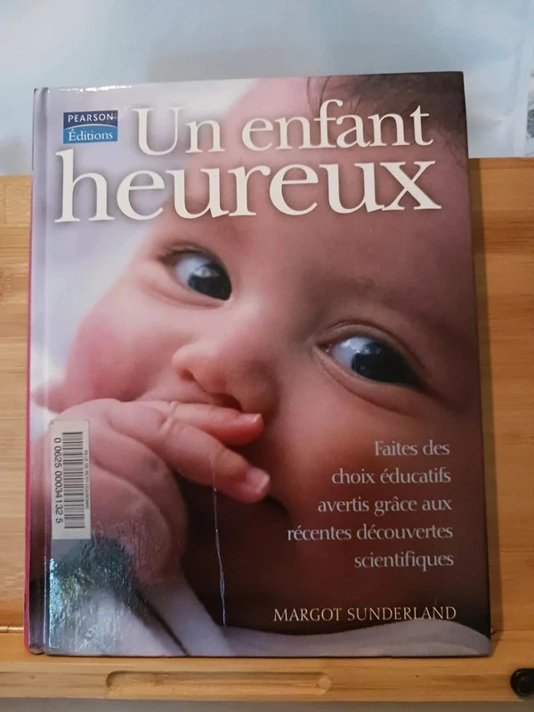 Un enfant heureux - 9782744091087
